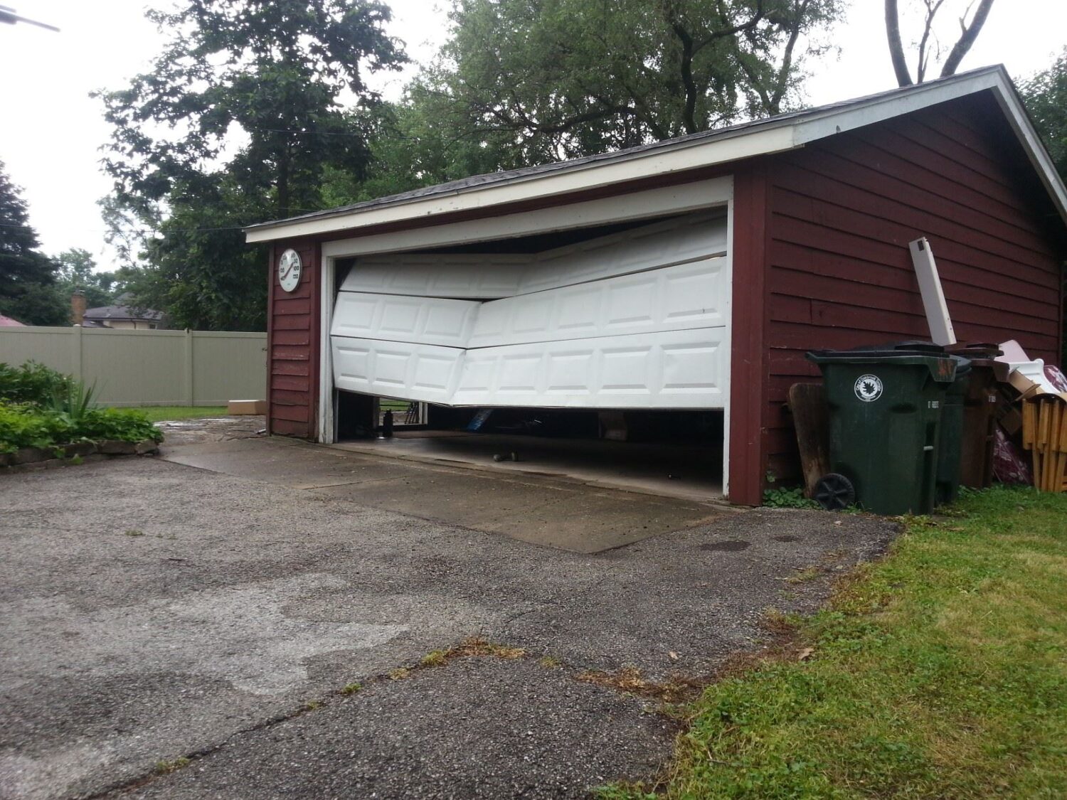 damaged garage door panels